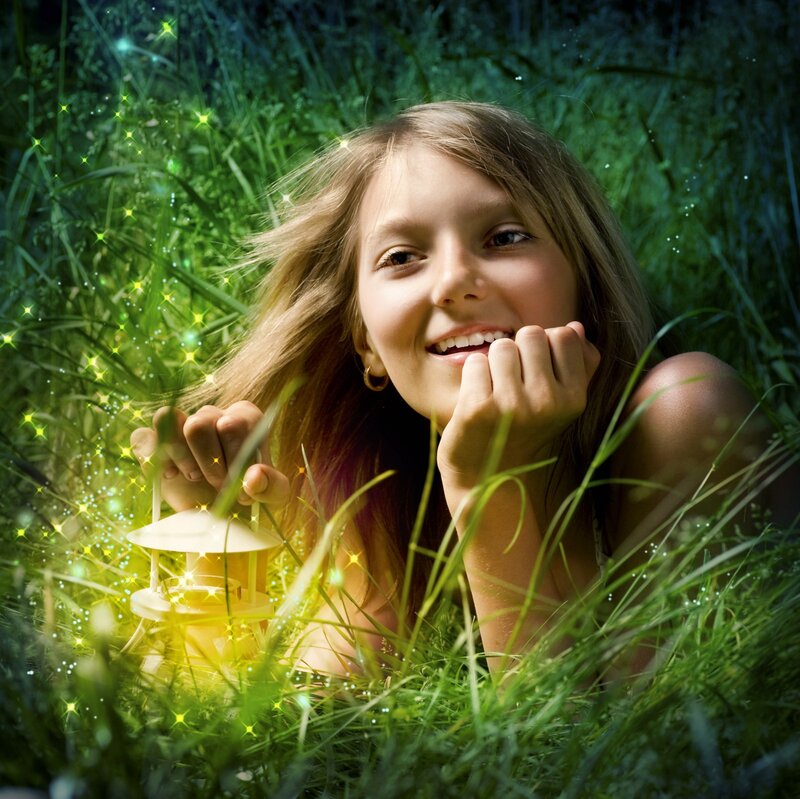 Girl in Grass with Lantern