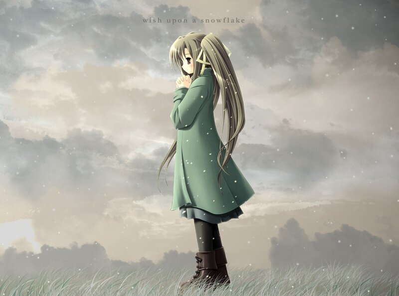 girl in green coat under snowfall