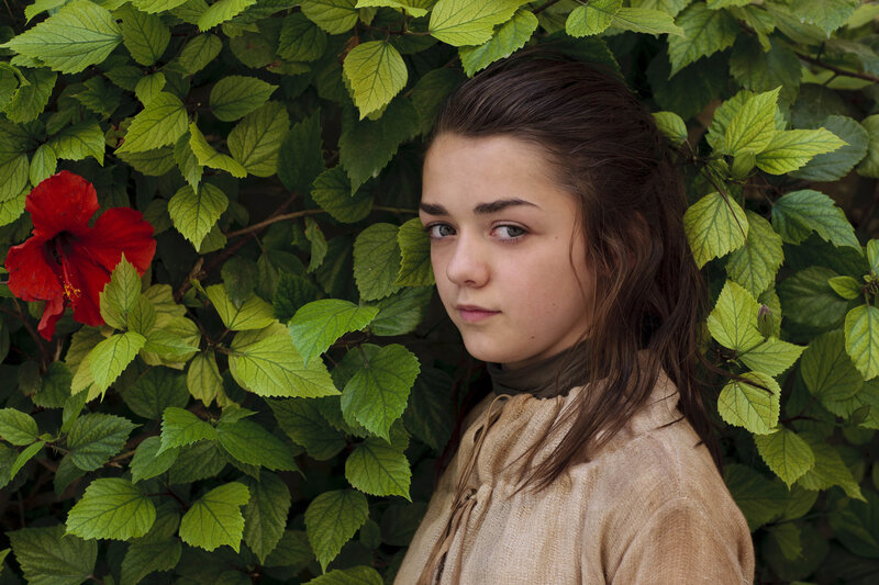 girl in green foliage