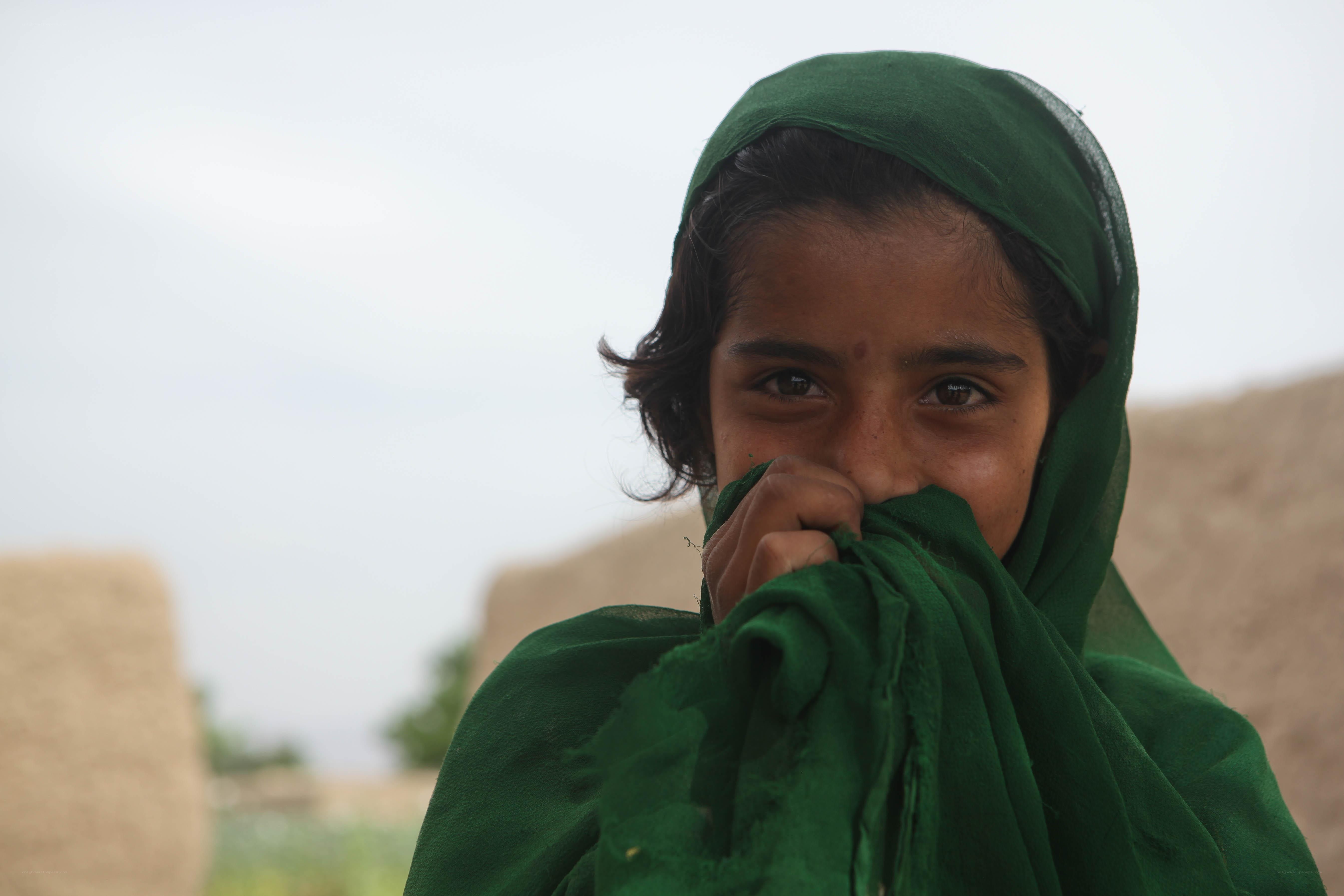 girl in green headscarf