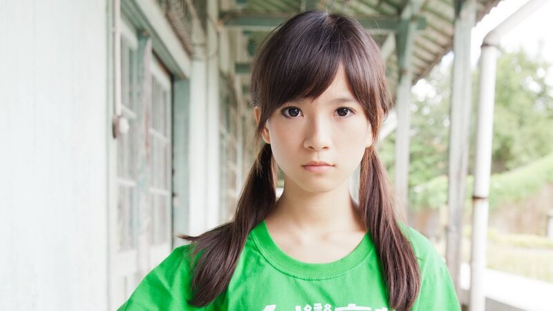 girl in green shirt