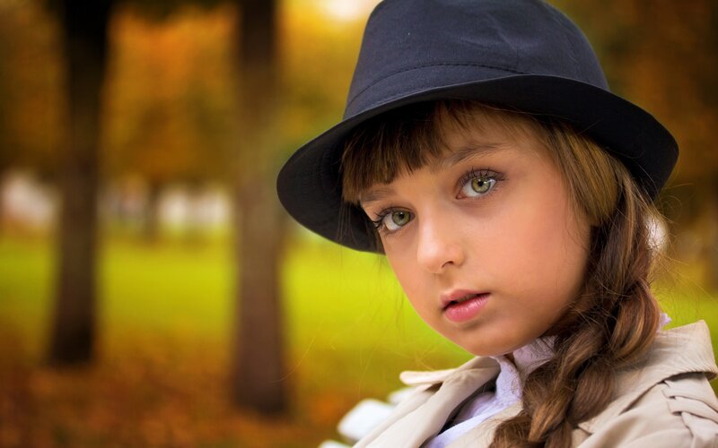 Girl in Hat and Trench Coat