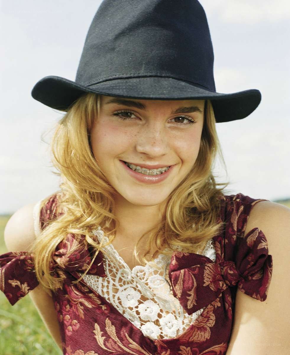 girl in hat smiling