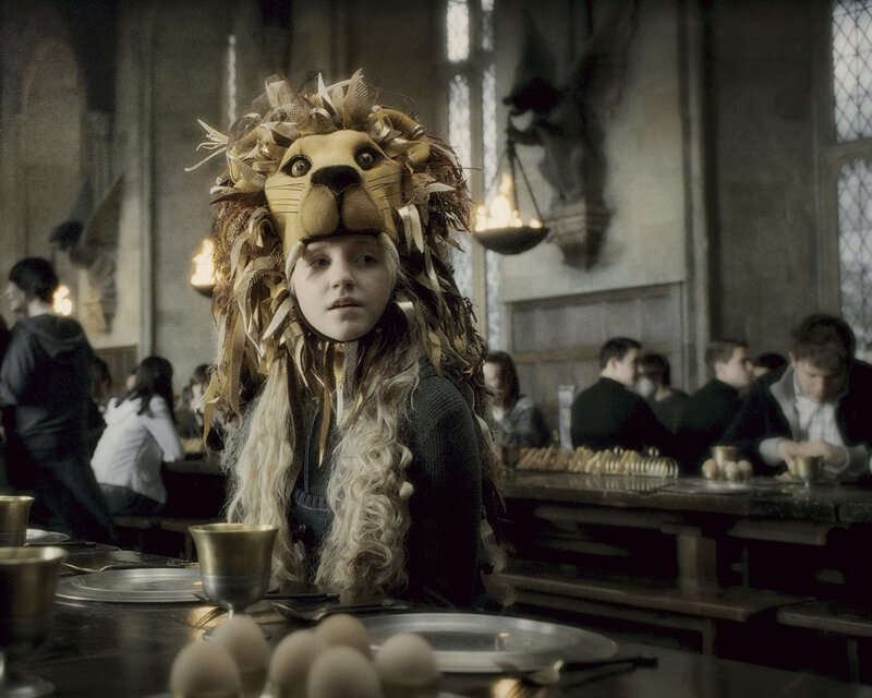 Girl in lion mask at dinner
