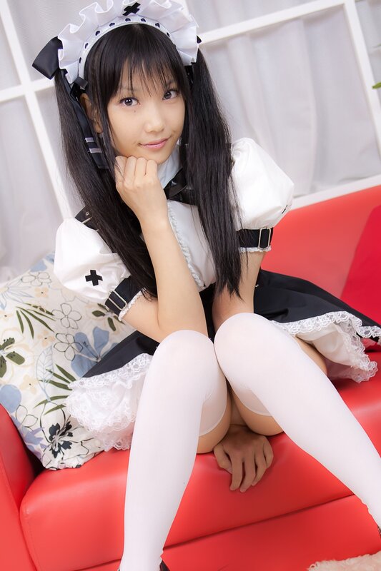 girl in maid costume sitting