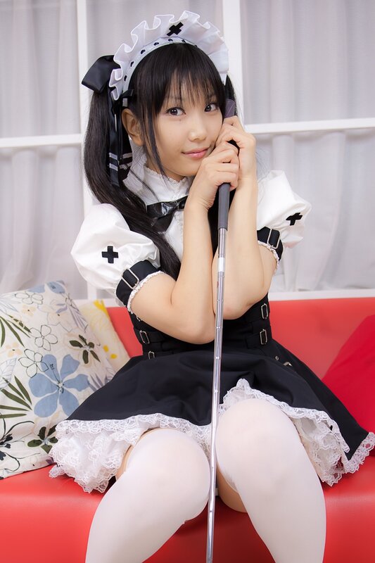 girl in maid costume sitting