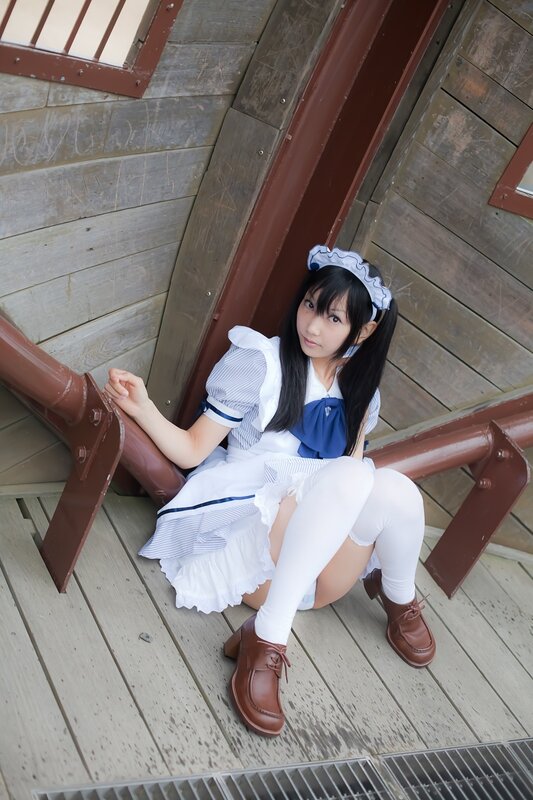 girl in maid costume sitting