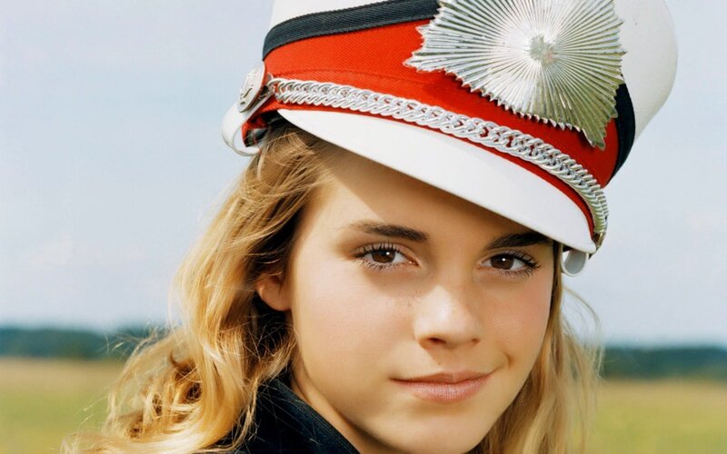 girl in military-style hat