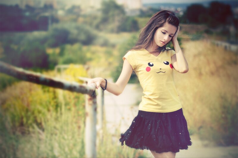Girl in Pikachu shirt outdoors