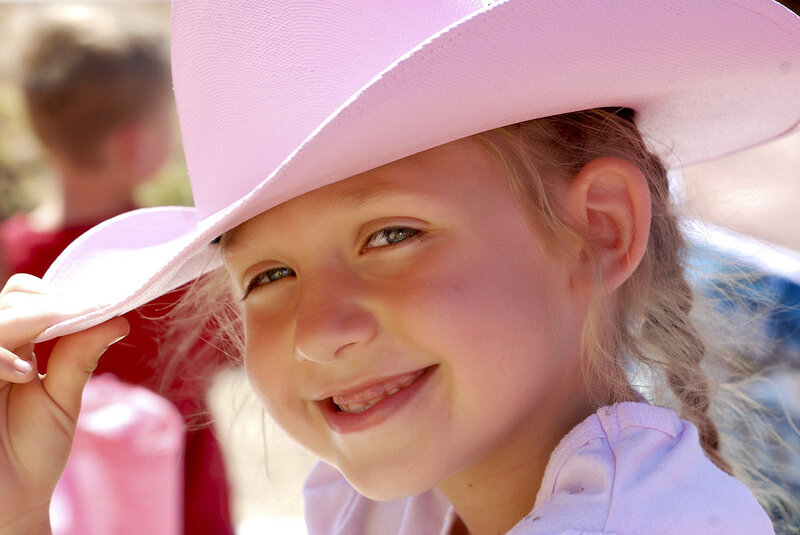 Girl in Pink Cowboy Hat — Happy