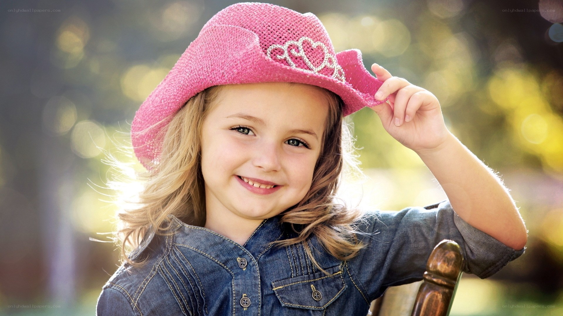 girl in pink cowboy hat