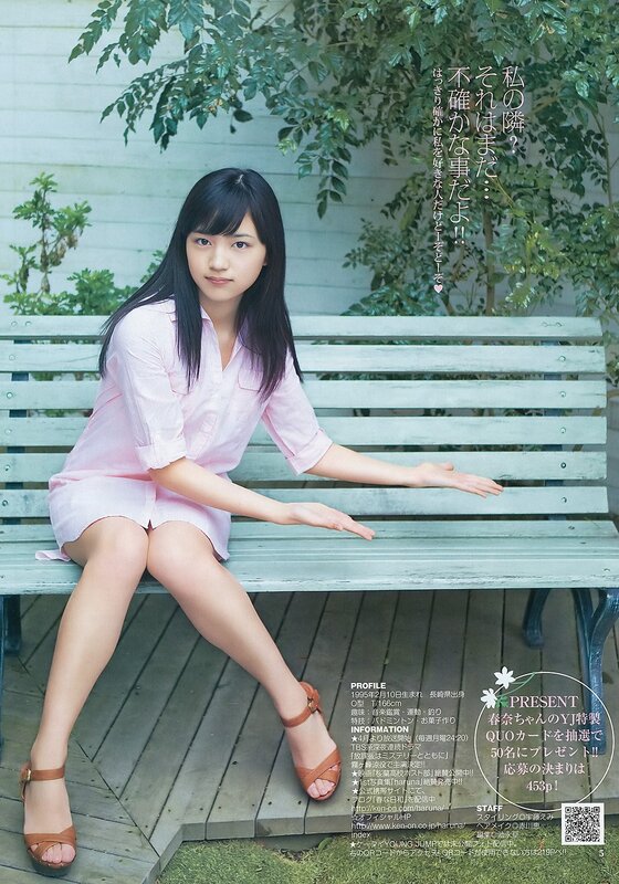 Girl in pink dress on bench