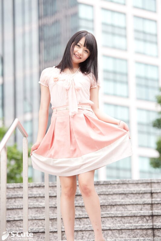 Girl in pink dress on stairs