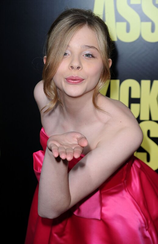 girl in pink dress posing