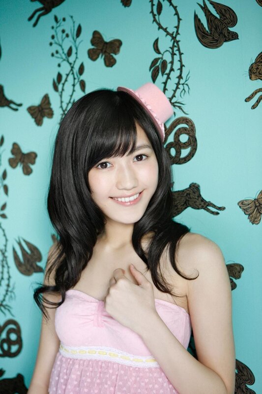 girl in pink dress smiling