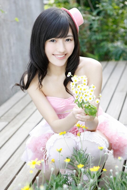 girl in pink dress with flowers