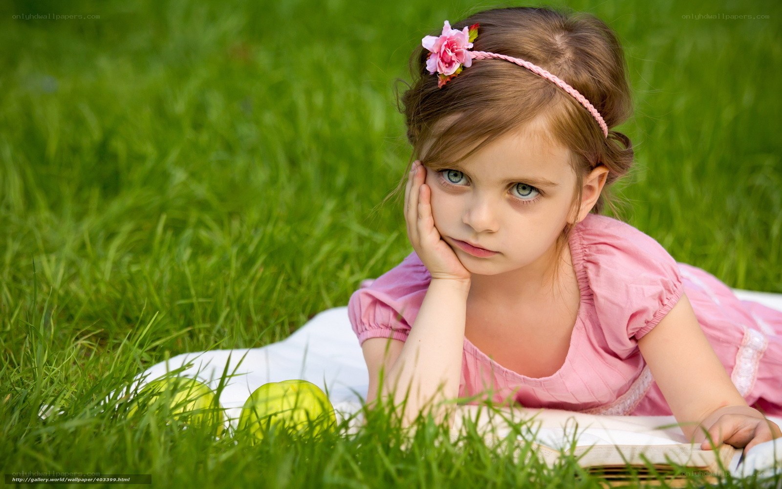 girl in pink on grass