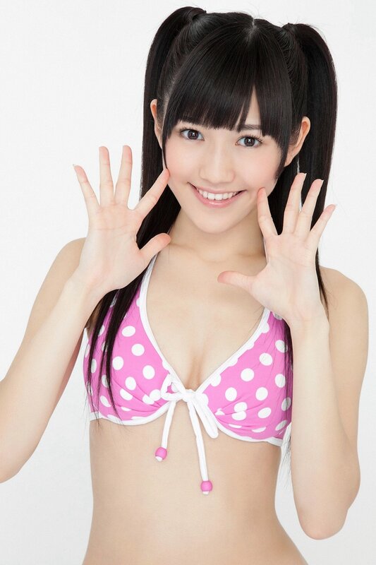 Girl in pink polka-dot bikini