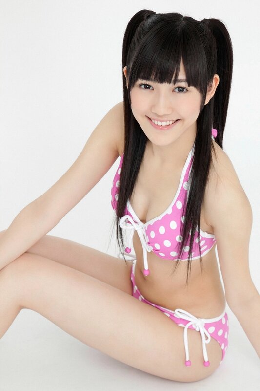 girl in pink polka dot bikini