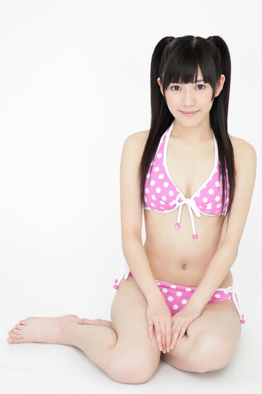 girl in pink polka dot bikini