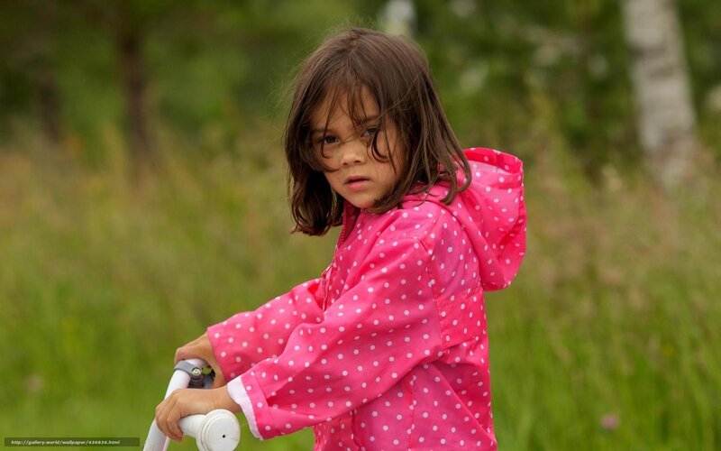 girl in pink raincoat