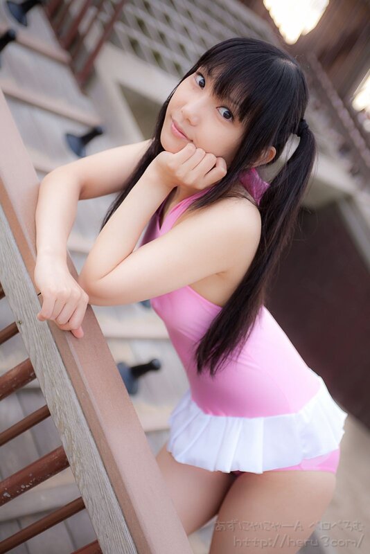 girl in pink swimsuit on deck
