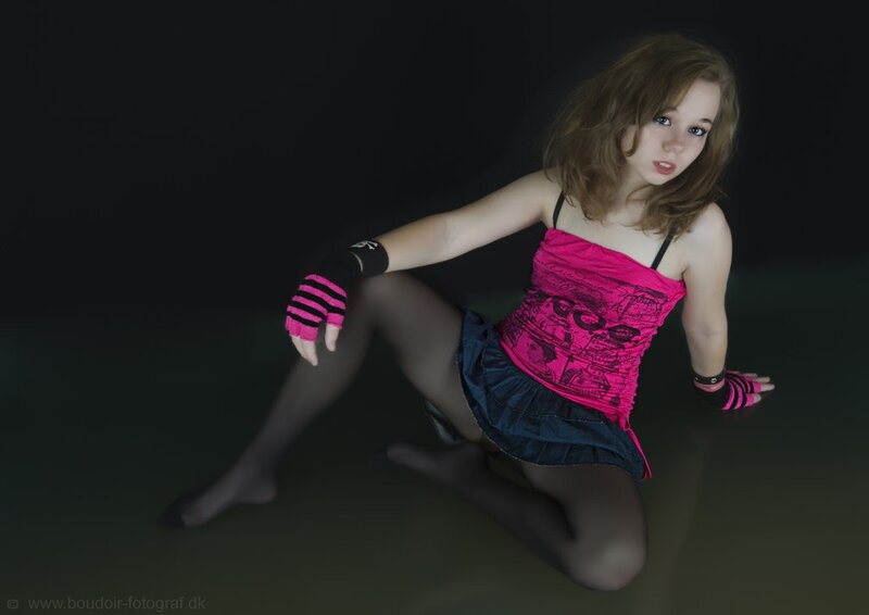 girl in pink top posing