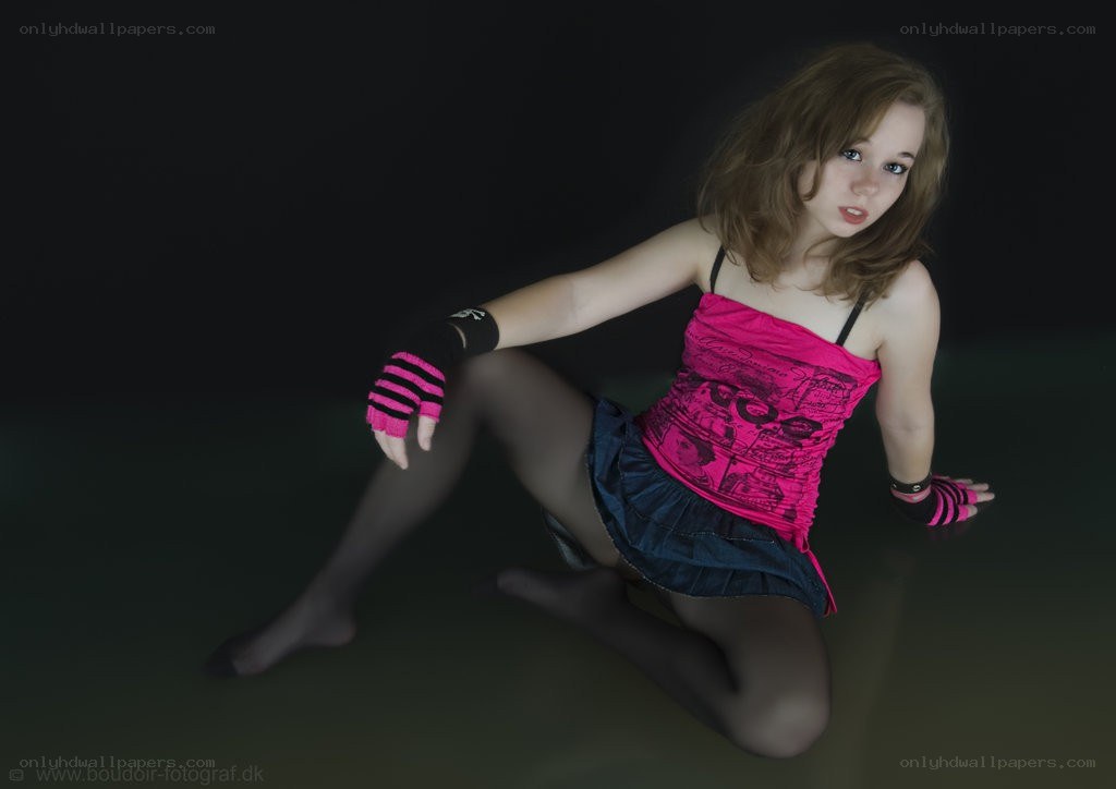 girl in pink top posing