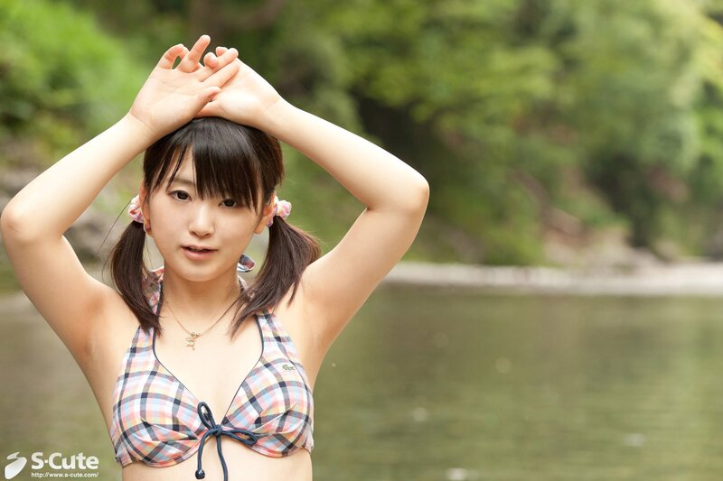 girl in plaid bikini by river