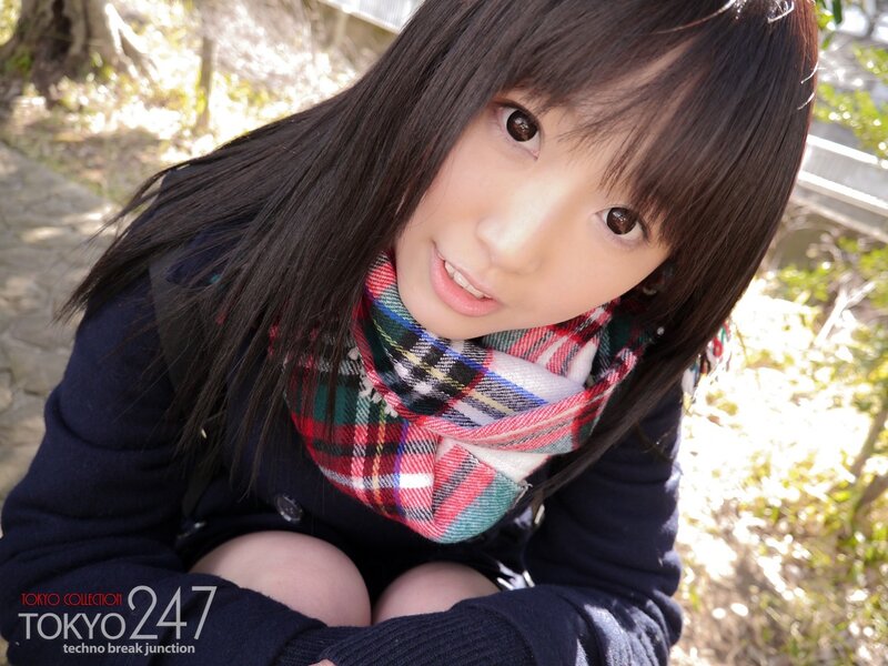 girl in plaid scarf outdoors