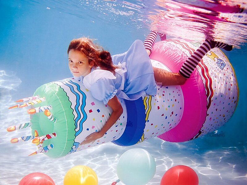 Girl in Pool with Float