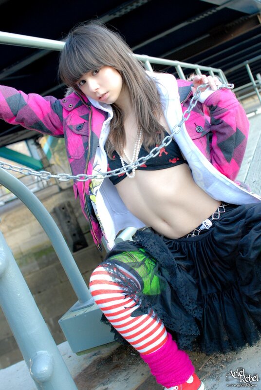 girl in punk outfit with chain