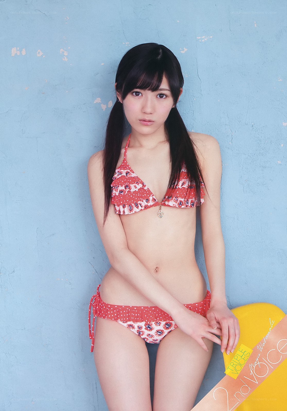 girl in red bikini posing