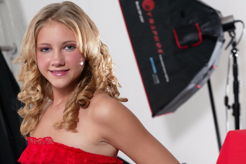 girl in red dress smiling