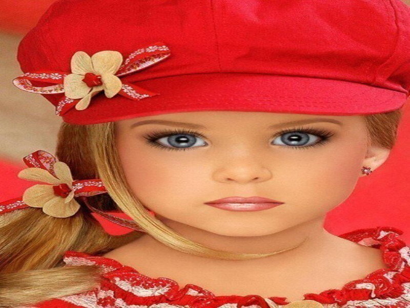 girl in red hat with flowers