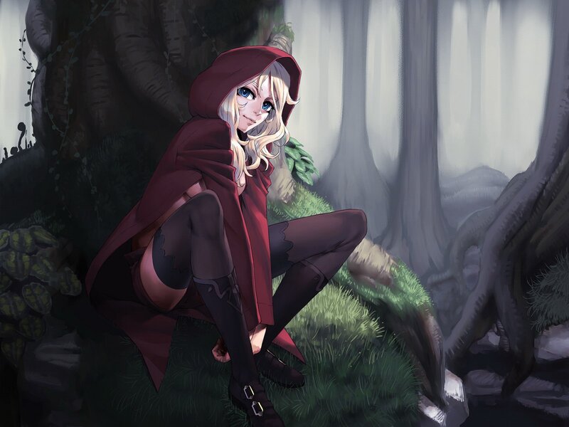 girl in red hood in forest