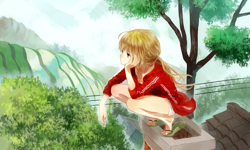 girl in red shirt under tree