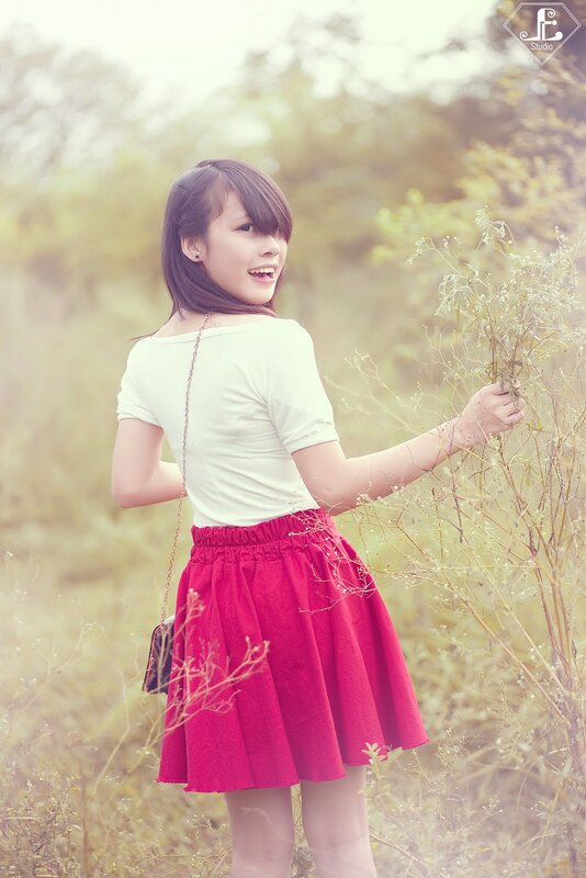 girl in red skirt outdoors