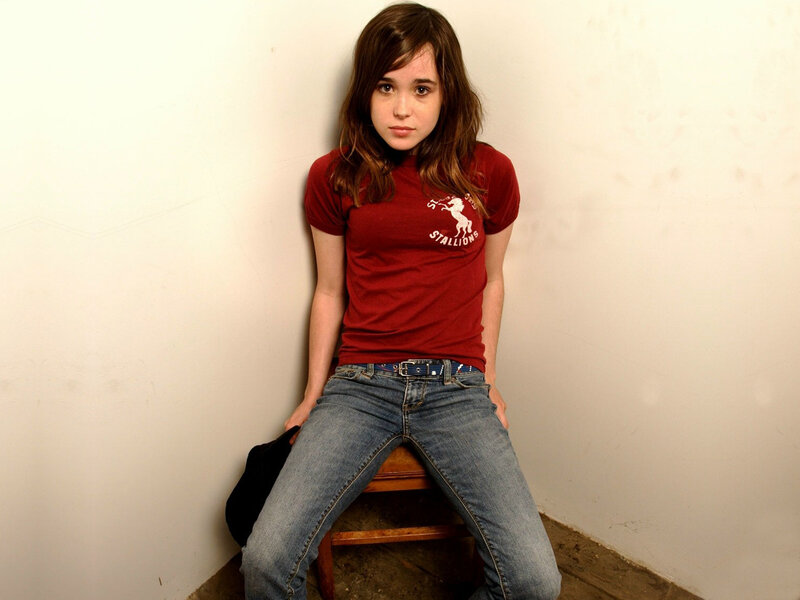 girl in red t-shirt sitting