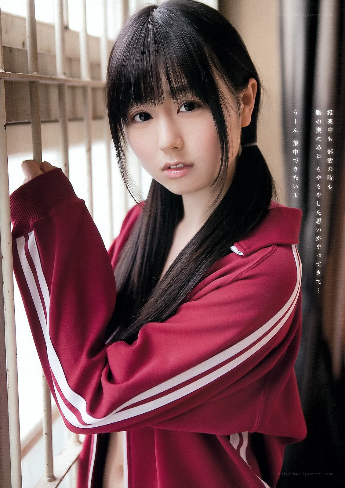 girl in red tracksuit