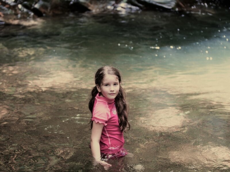 Girl in River Water