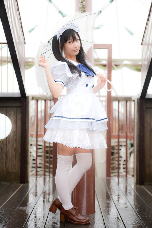 girl in sailor outfit with umbrella