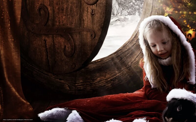 girl in santa outfit with rabbit