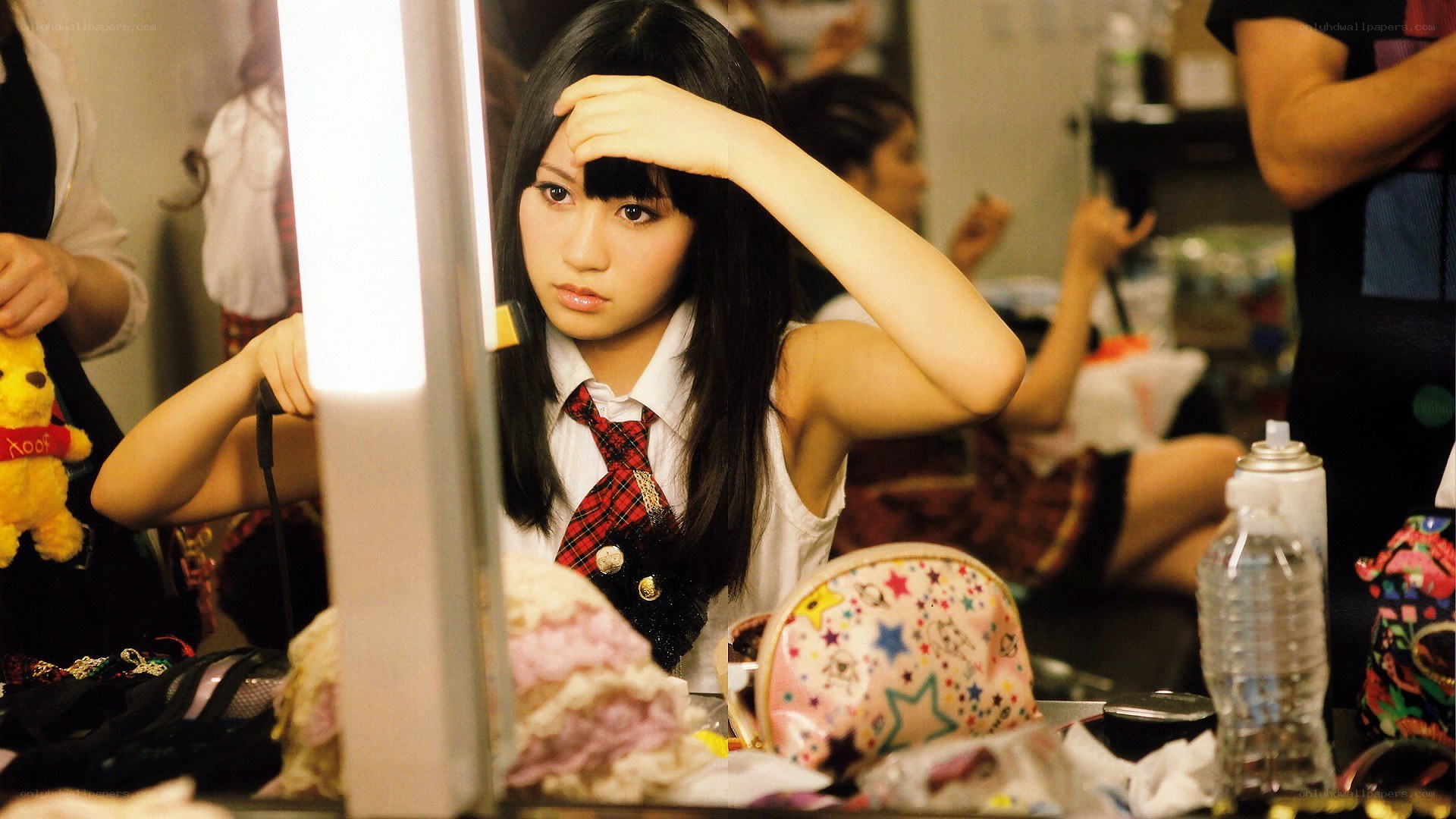 girl in school uniform backstage