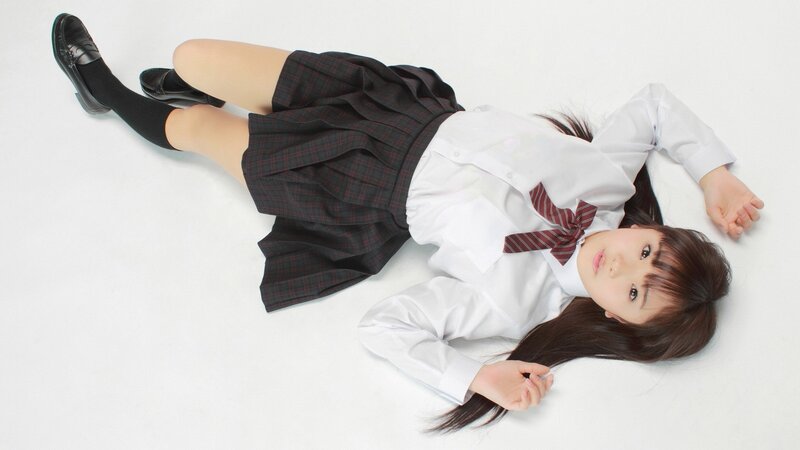 girl in school uniform lying down
