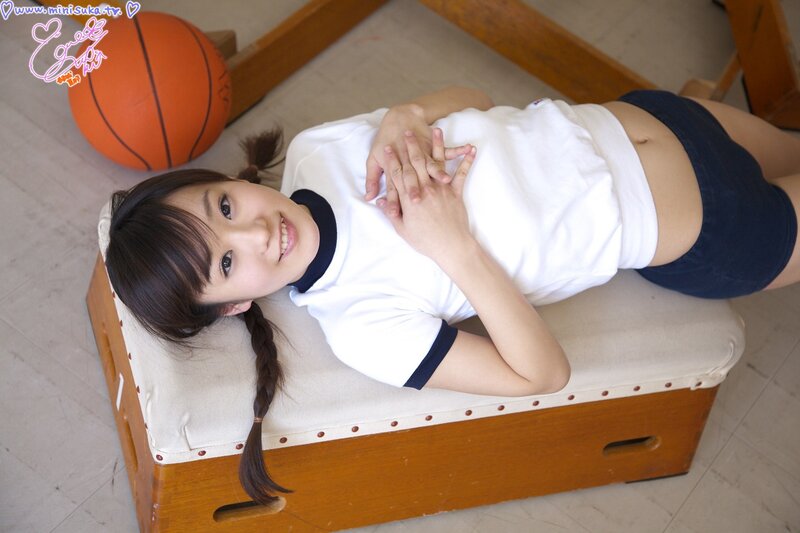 Girl in school uniform lying down