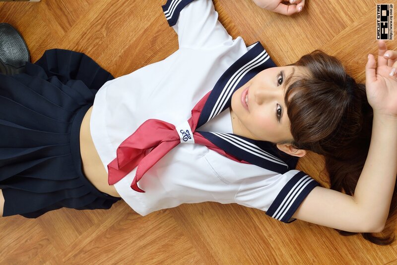 girl in school uniform lying on floor
