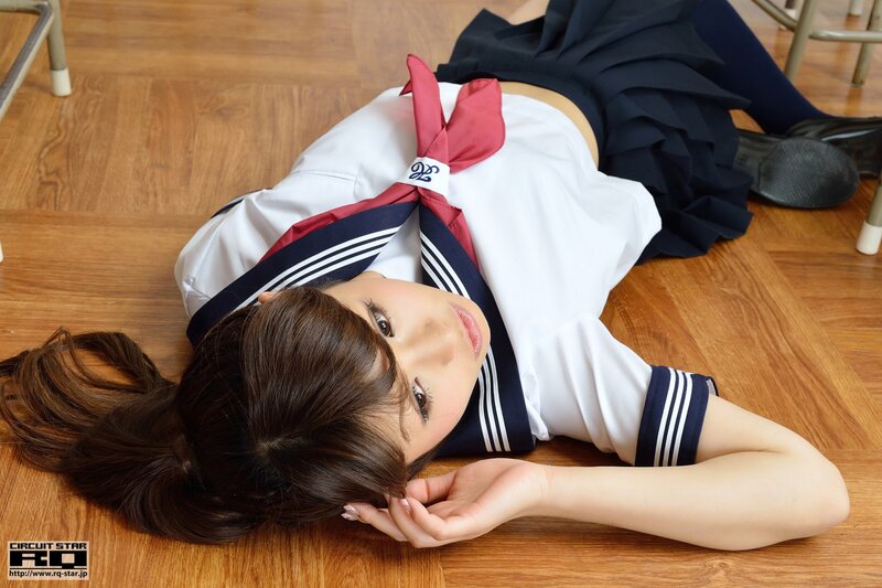girl in school uniform lying on floor