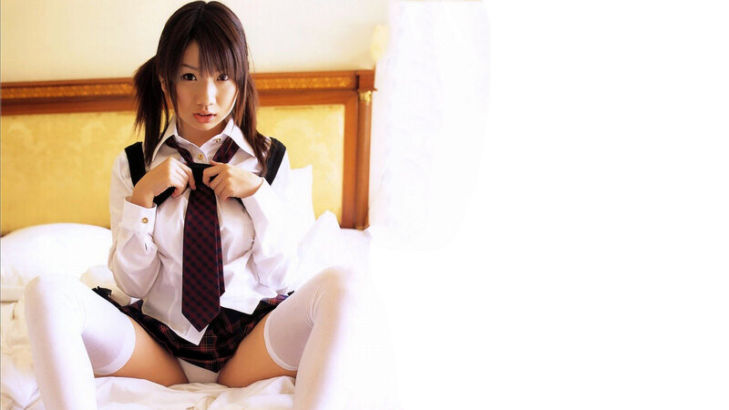 girl in school uniform on bed