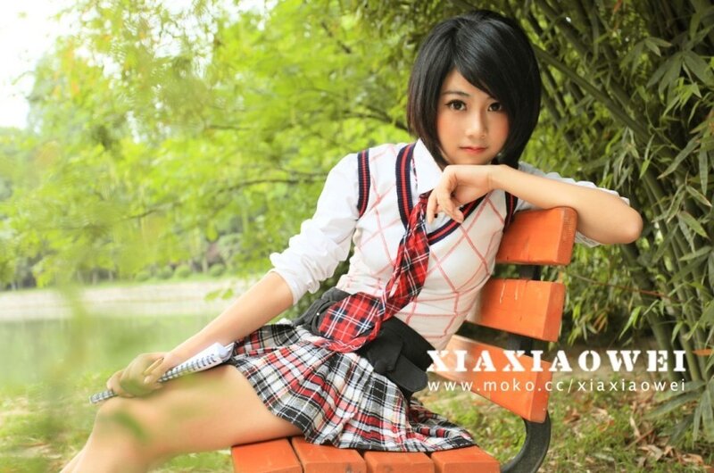 girl in school uniform on bench